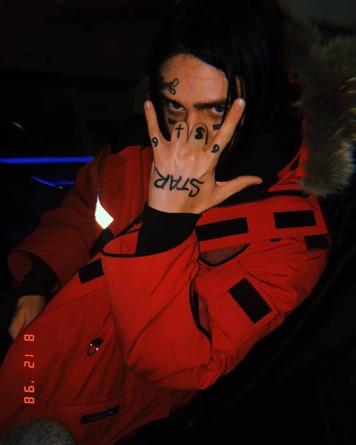 Τατουάζ αστέρι στο μέτωπο του βραχίονα