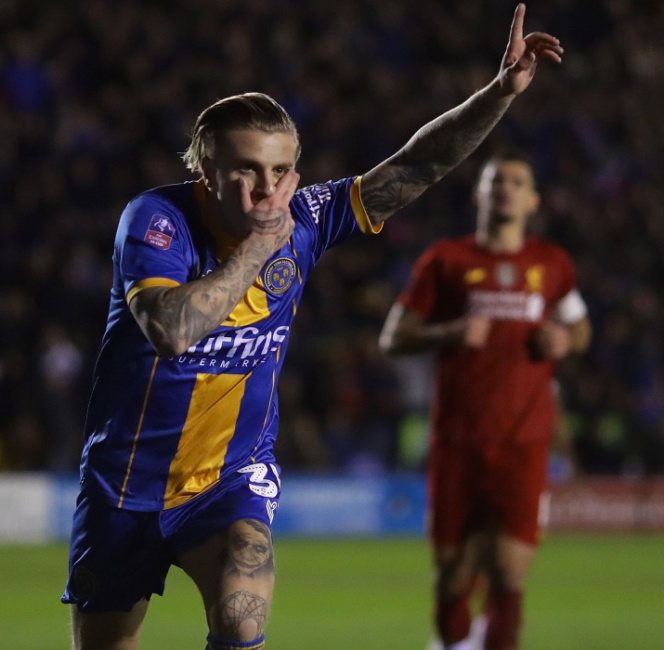 Tattoo Joker Smile on his arm. Sketches, photo