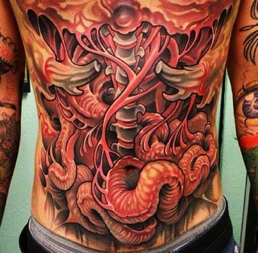 Tatouage dans le style Bioorganic. Photo, croquis, sens