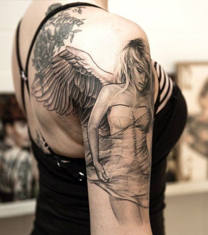 Tattoo in the shape of angel girl