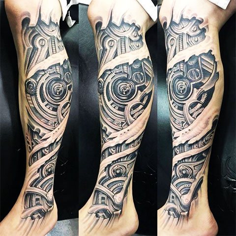 Tatuaggio di biomeccanica sulla gamba