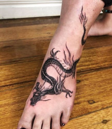 Tatouage d'un dragon. Photo, signification, croquis pour filles, hommes. Photo