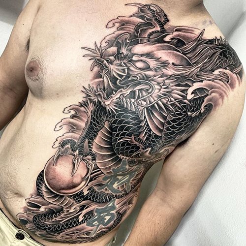 Tatouage d'un dragon. Photo, signification, croquis pour filles, hommes. Photo