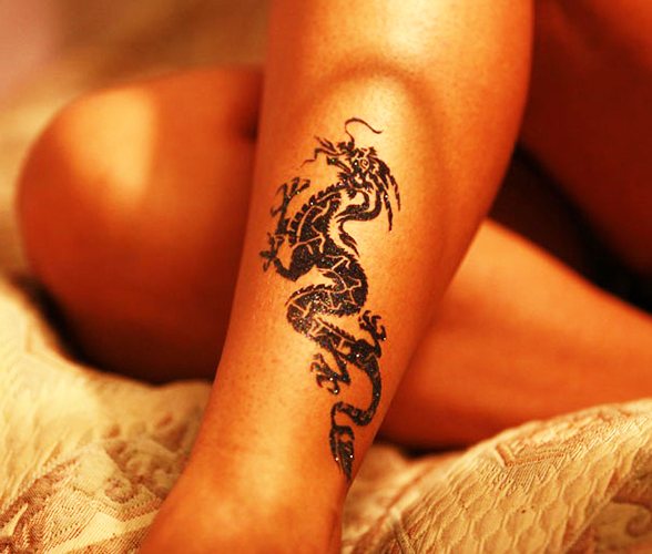 Tatouage d'un dragon. Photo, signification, croquis pour filles, hommes. Photo