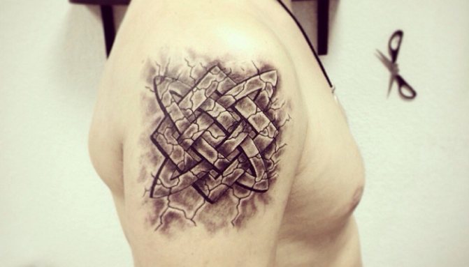 Tattoo of a Square of Svarog on his shoulder