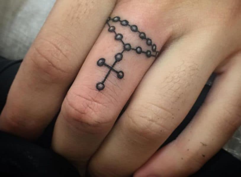 Tattoo on his finger
