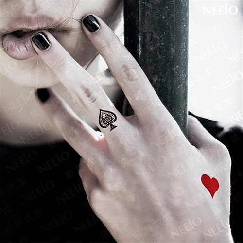 Tattoo of Spades. Signification de la combinaison de pique chez les femmes et les hommes.