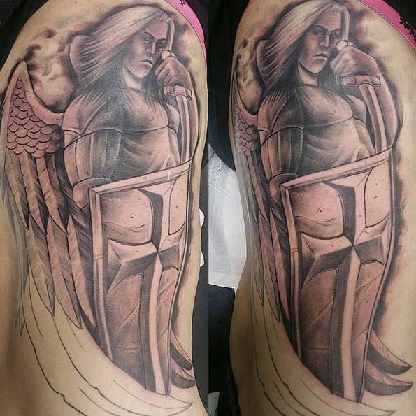 Tattoo of the Archangel with a shield and a sword