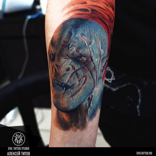 Grüner Kobold Symbol böse Tattoo