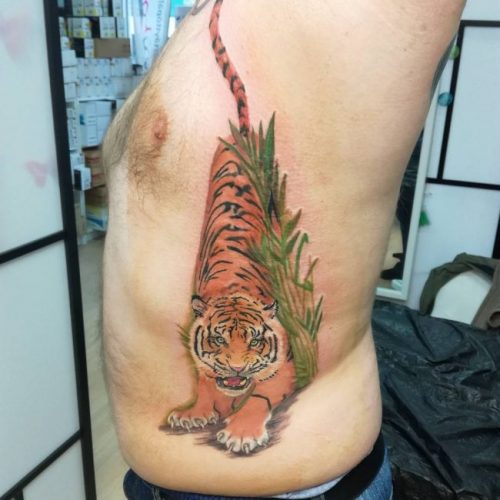 Rib tatuointi: 55 mallia miehille