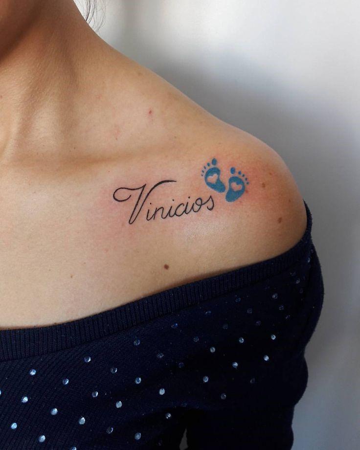 Baby name tattoo on the shoulder