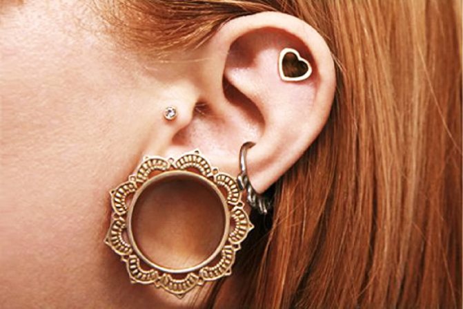 Tunnels in the ears in girls. Photos, size of stretch marks, care