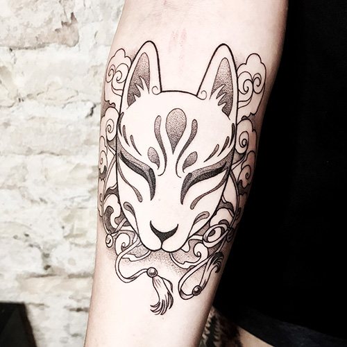 Japanese mask of a fox Kitsune tattoo. Meaning, sketch, photo