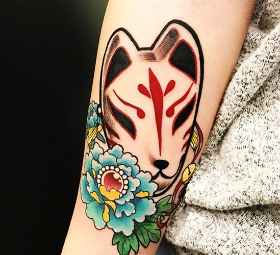 Japanese mask of a fox Kitsune tattoo. Meaning, sketch, photo