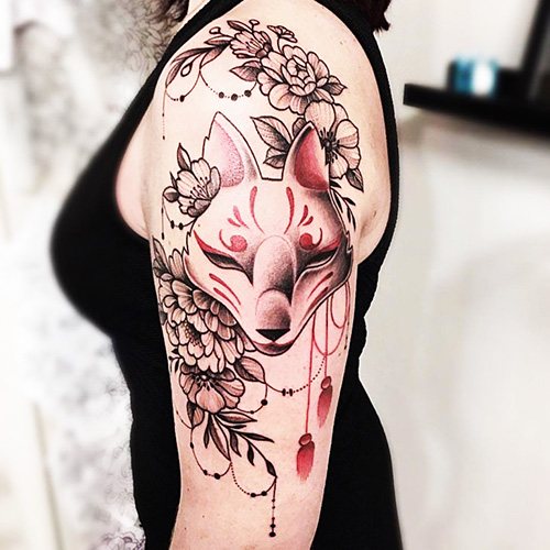 Japanese mask of a fox Kitsune tattoo. Meaning, sketch, photo