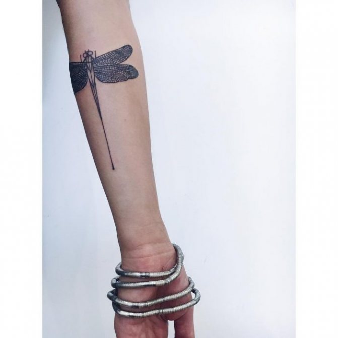 female dragonfly tattoo