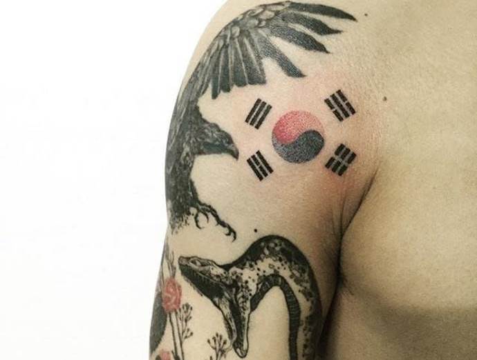 snake and eagle on the shoulder